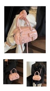 Detail showing pink glossy boston bag with silver buckles and detachable shoulder strap