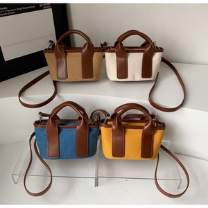 Detailed display of vintage mini pillow bags in khaki, beige, blue, and yellow finishes