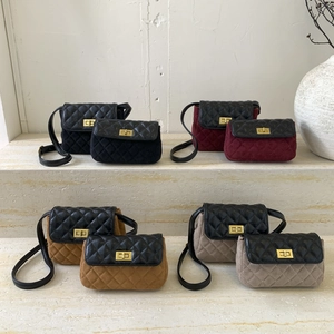 Quilted crossbody bags in four colors with matte suede panels and gold metal twist locks