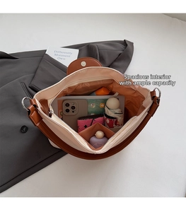 Top view of large tote bag interior showing spacious capacity with pockets and zipper