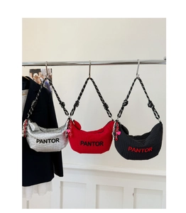 Three quilted crescent bags in silver red and black with PANTOR text and heart charms