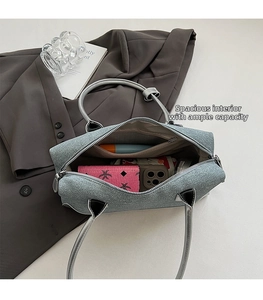 Large capacity blue denim Boston bag interior showing spacious storage for essentials