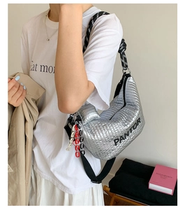 Close-up of silver quilted crossbody bag with PANTOR logo and woven rope shoulder strap