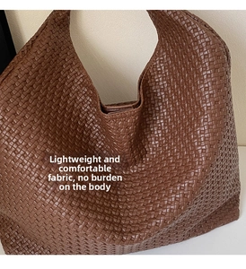 Close-up of the intricate brown woven texture and soft PU leather on this tote bag
