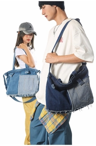 Close-up of patchwork denim tote bag with distressed frayed edges and practical pockets