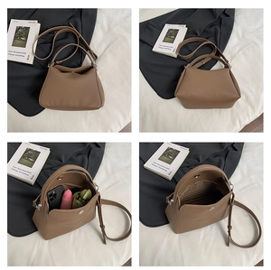 Sac bandoulière marron en cuir grainé avec détails de rangement intérieur spacieux