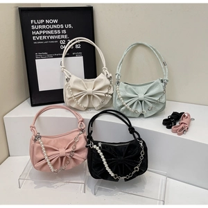 Bow-knot handbags in four colors with pearl chain handles and adjustable straps
