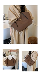 Macro detail of brown quilted tote bag with golden lock and chain shoulder strap