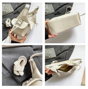 Vue détaillée du sac à bandoulière blanc crème plissé avec sangle et structure interne