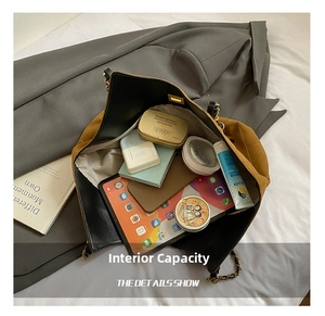 Large capacity tote bag interior showing iPad, phone and cosmetics with chain strap