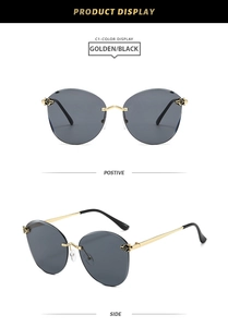 Detail of gold metal hinge featuring a leopard head relief on rimless sunglasses
