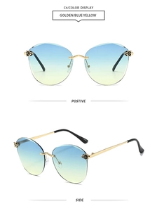Frameless sunglasses with blue-yellow gradient lenses and golden honeycomb metal temples