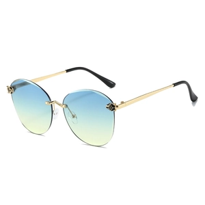 Frameless ocean gradient lens sunglasses with cute bear accent and gold metal temples
