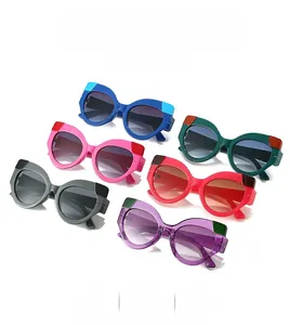 Collection de lunettes de soleil œil de chat oversize en plusieurs coloris avec monture bicolore