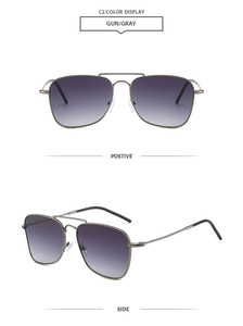 Detail view showing gunmetal frame and purple gradient lenses of aviator sunglasses