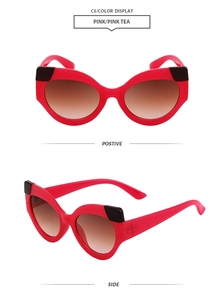 Vue détaillée des lunettes de soleil œil de chat roses avec verres dégradés chic