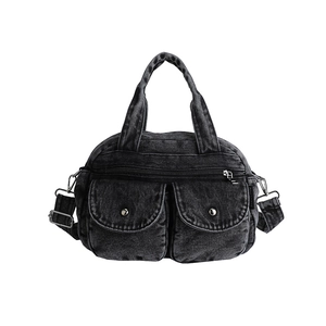 Retro black washed denim crossbody bag with dual front flap pockets and silver hardware