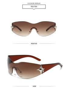 Detail view of tea-tinted frameless sunglasses featuring decorative metal stars on hinges