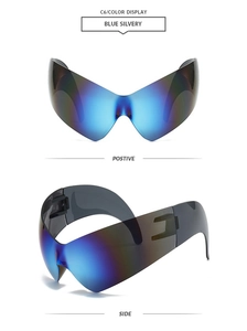 Detail view of silver mirrored cat-eye sunglasses with a futuristic punk design
