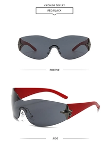 Detail of red temple and silver star ornament on Y2K wraparound sunglasses