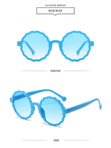 Detail of round flower-shaped blue kids sunglasses with matching gradient blue lenses