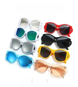 Flat lay of colorful oval punk sunglasses with wide frames and reflective lenses