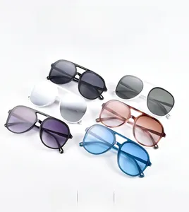 Flat lay of retro pilot sunglasses in six colors with stylish double bridge resin frames