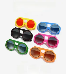 Flat lay of colorful octagonal sunglasses with round lenses in six vibrant neon colors