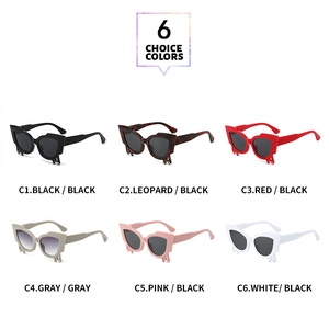 Detail view of cat eye sunglasses with liquid drip design in six trendy color options