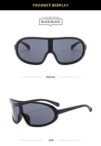 Detail view of black oversized sports sunglasses showing front and side profile angles