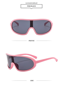 Front and side views of pink frame cycling sunglasses with oversized grey lenses