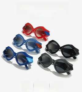 Lip-shaped sunglasses in multiple colors featuring thick plastic frames and gradient lenses