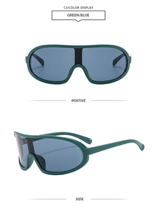 Detail view of oversized sports sunglasses with green frame and blue mirror lens