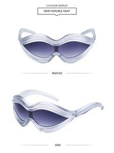 Close-up of futuristic wave-shaped sunglasses in translucent gray with side and front view