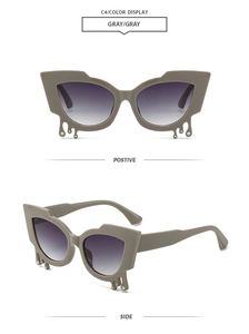 Gray frame cat eye sunglasses with fluid drop design and rhinestones on side and front