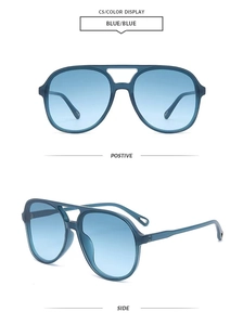 Detail of pilot sunglasses with blue frames, gradient lenses and hollow temple tips
