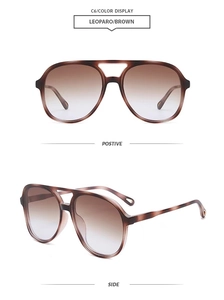 Close-up of leopard brown aviator sunglasses with retro double bridge and gradient lenses