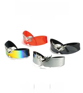 Close-up of Y2K cyberpunk wrap sunglasses with heart flame metallic accents