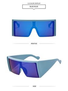 Detail view of modern oversized blue square semi-rimless sunglasses with wide temples