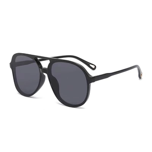 Classic double-bridge pilot sunglasses with black frames and dark gray lenses
