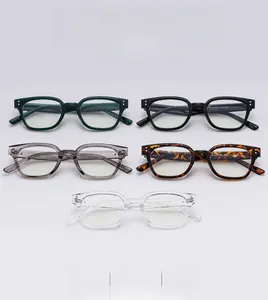 Close-up of vintage square frame glasses in various colors like tortoise and grey