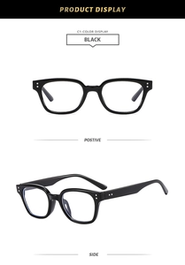 Detail view of black oversized square glasses frames with metal rivets on white background