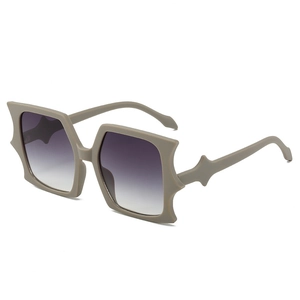 Fashionable oversized rectangular bat-wing sunglasses with gradient grey lenses