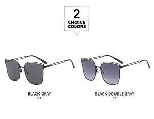 Detail view of square metal sunglasses with double bridge and gradient lenses