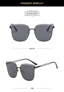 Front and side view of black metal sunglasses with hollow double-line temple design