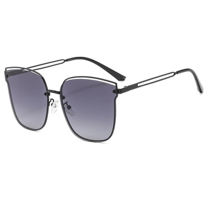 Modern oversized hollow double-bridge sunglasses with black frame and grey gradient lenses