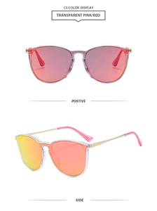 Detailed view of pink mirror lenses and gold metal temples on fashion aviator sunglasses