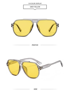 Détail de lunettes de soleil carrées vintage avec monture grise et verres jaunes