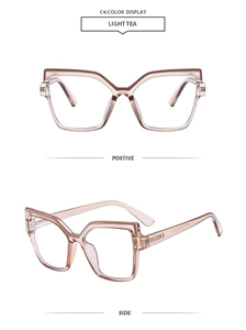 Detail view of light tea cat-eye glasses frame with metal hinges and transparent finish