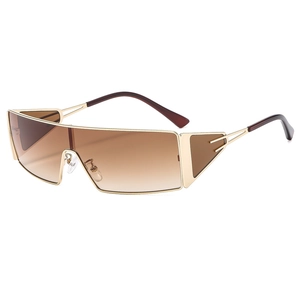 Lunettes de soleil modernes en métal doré avec monture bouclier et verres bruns dégradés